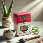 Aztec Secret Health & Beauty Indian Healing Clay in its iconic red and white packaging, placed on a marble countertop with natural elements like aloe vera leaves, a wooden spoon with clay powder, and a bowl of mixed clay paste, highlighting a natural skincare theme.